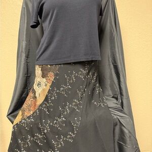 Carolyn Taylor black ruffle neck shirt with Floral-Accented Maxi Skirt